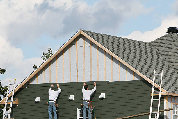 Professional Siding Contractor technician working in Bay Shore, NY